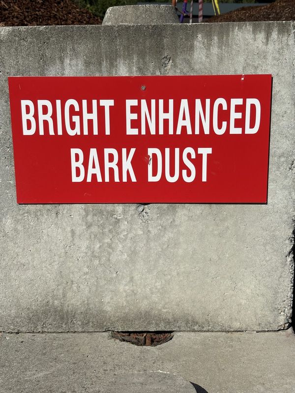Yard sign for Bright Enhanced Bark Dust