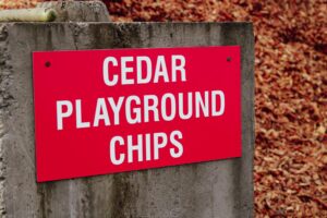 Yard sign for Cedar Playground Chips